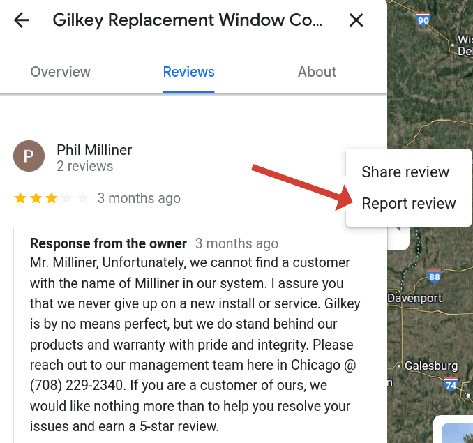 Image of a review in GBP showing where to find "Report review". 